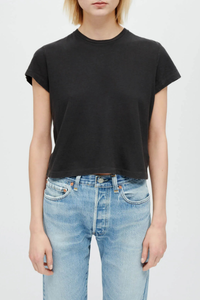 front profile model wearing  1950's Boxy Short Sleeve Tee Faded Black Boxy Crop Tee
Crew neck
Short sleeve
Loose fit
100% combed cotton