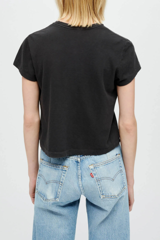 back profile model wearing  1950's Boxy Short Sleeve Tee Faded Black Boxy Crop Tee
Crew neck
Short sleeve
Loose fit
100% combed cotton
