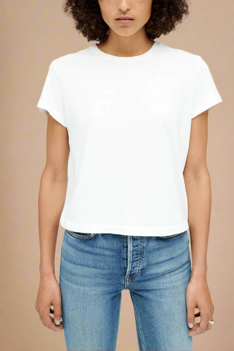 front model pose wearing 1950's Boxy Short Sleeve cotton crewneck Tee In Optic Whitere/done