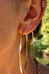 model wearing 2" Skinny Hoops 14k White Gold