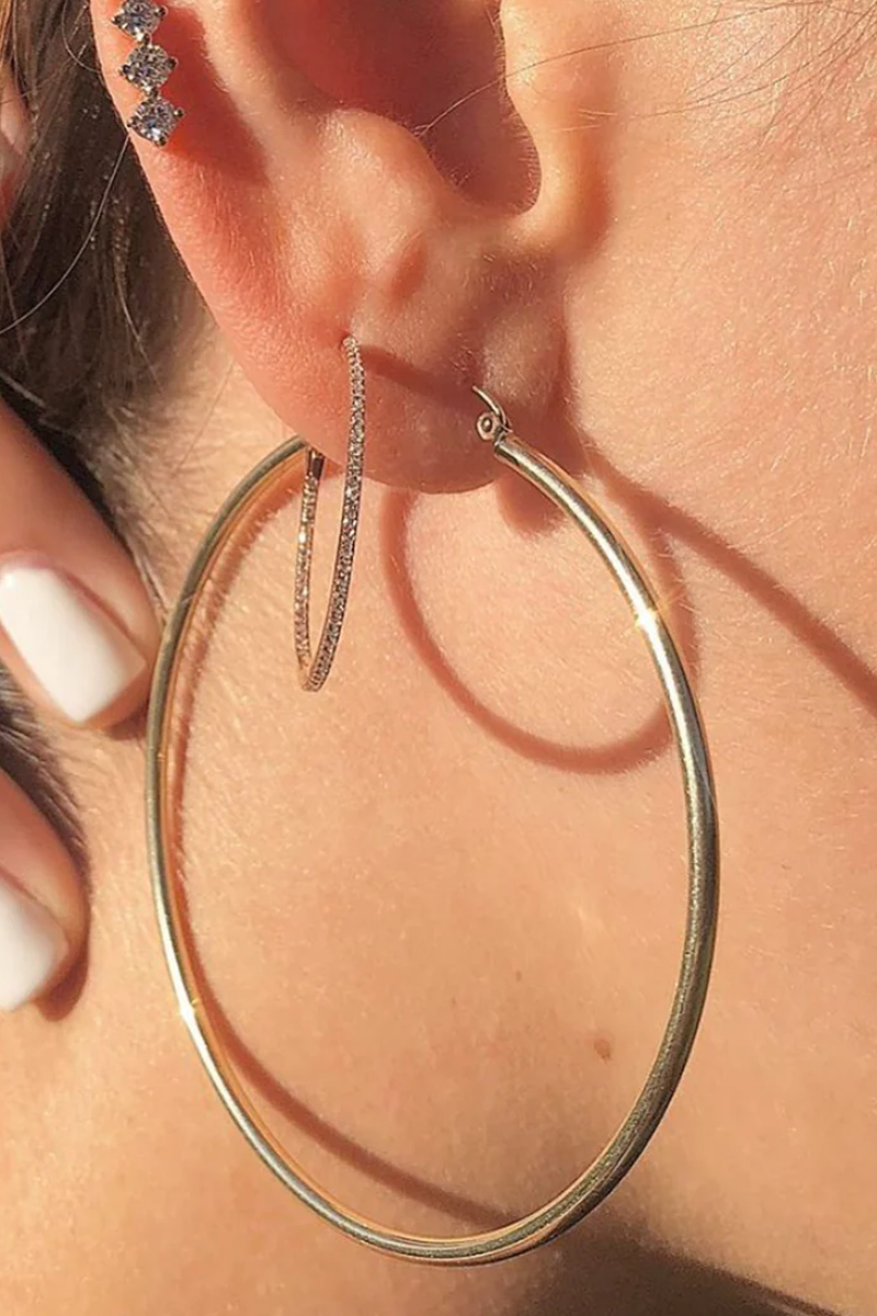 model wearing 2" Skinny Hoops 14k White Gold
