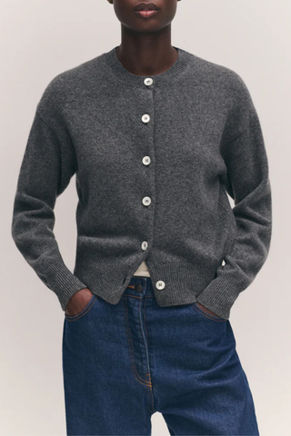 front profile model wearing Ada Crew Neck Cardigan Derby Grey subtly slouchy relaxed silhouette
Trocus shell buttons
100% Geelong Lambswool
Mid-weight
100% Scottish Spun yarn