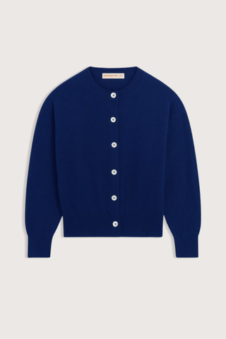 flat lay Ada Crew Neck Cardigan Smalt Blue subtly slouchy relaxed silhouette
Trocus shell buttons
100% Geelong Lambswool
Mid-weight 
100% Scottish Spun yarn