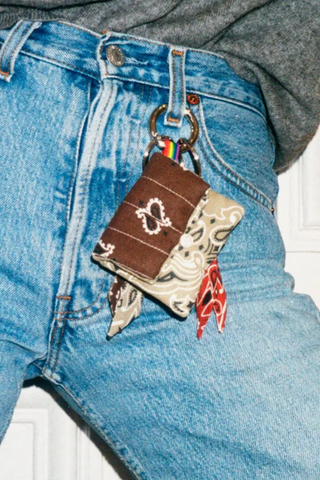 model wearing Airpods Case Maroon/Beige bandana cotton with snap hook on belt loop