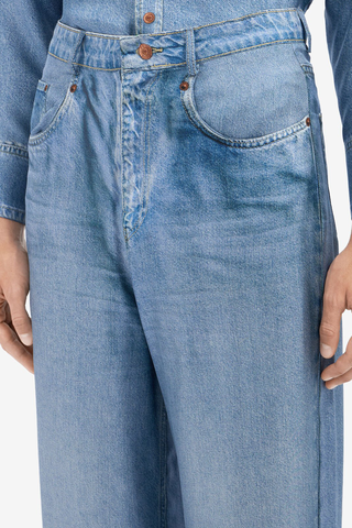 close up detail of Aloe Silk Pants light blue  Mimic the casual attitude of denim with the refined fluidity of silk