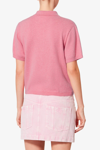 back profile Althea S/S Polo Bubblegum Cotton and wool blend knit polo
Polo collar extending into a button tab
Short sleeves
"IM" logo embroidered on the chest
Ribbed finishes
Fitted cut
70% cotton (1), 30% wool