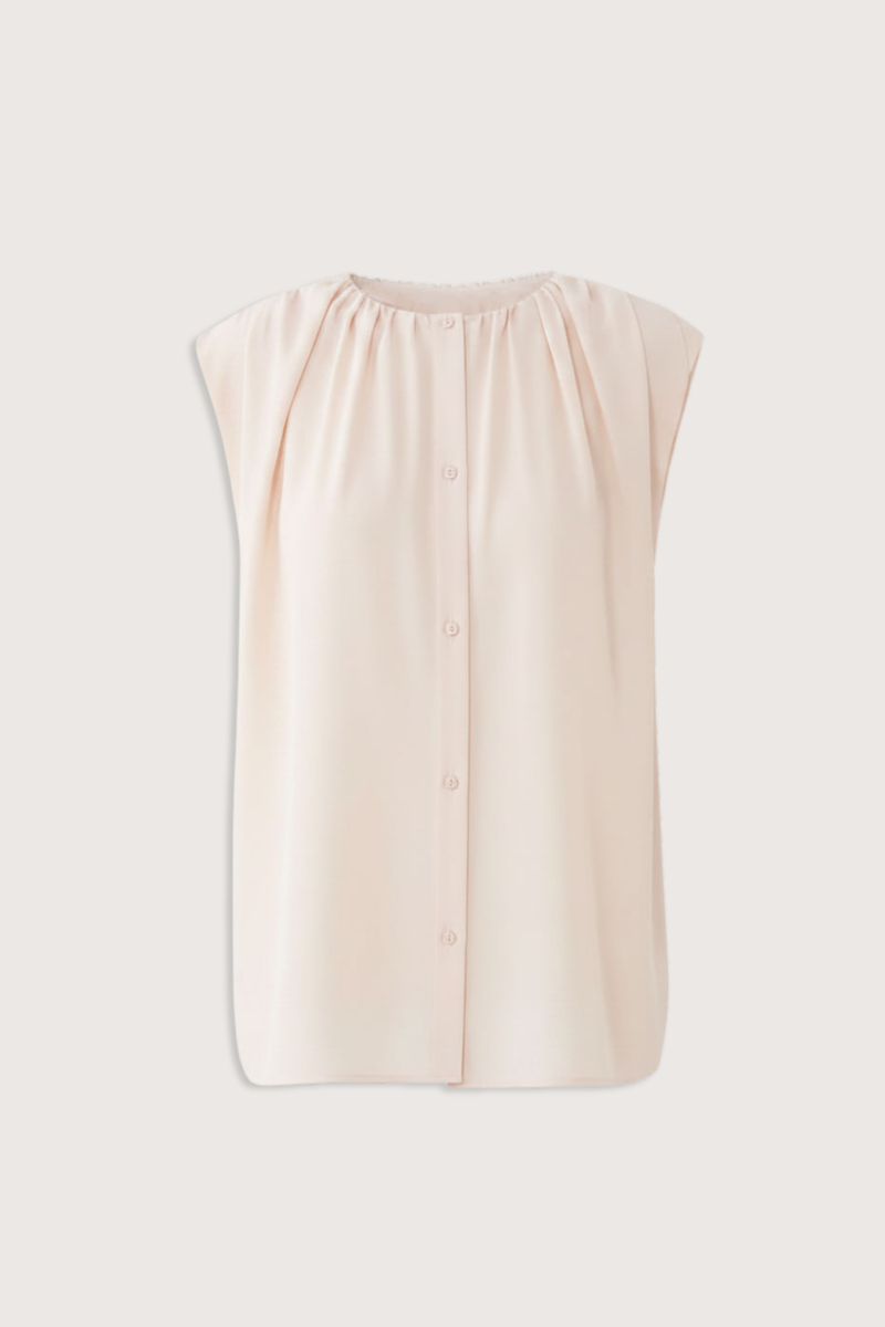flat lay Anca Gathered Top Light Pink Gathered throughout
Structured shoulder
Button front
Crew neck
Cotton/Silk Voile
65% Cotton, 35% Silk