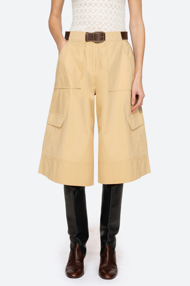front profile model wearing Andrea Culottes yellow khaki multi Workwear culottes
Cropped wide-leg silhouette
Two-tone coloring
Includes a leather belt
100% cotton