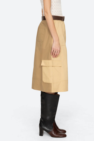 side profile model wearing Andrea Culottes yellow khaki multi Workwear culottes
Cropped wide-leg silhouette
Two-tone coloring
Includes a leather belt
100% cotton