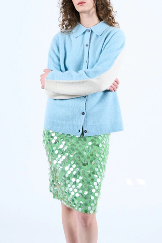 model wearing Andrew Button Down Merino/Cashmere blue long sleeve cardigan shirt blue front white back colorblock