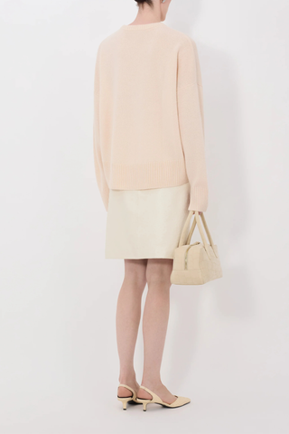 back profile model wearing Anton Crew Cashmere Sweater light pink Slightly oval fit
Crew neck
Drop shoulders
Ribbed details
Vented cuffs