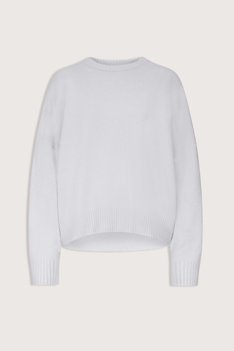 flat lay Anton Crew Cashmere Sweater Light Blue Slightly oval fit
Enveloping, effortless silhouette
Crew neck
Drop shoulders
Ribbed details
Vented cuffs
100% Cashmere