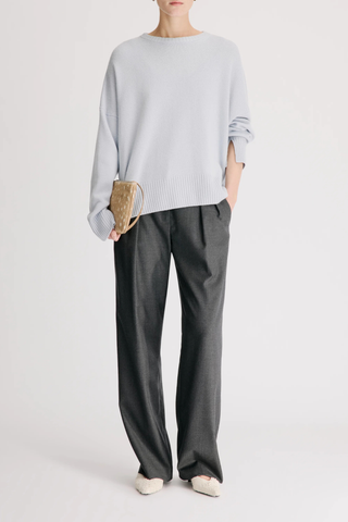 front profile model wearing Anton Crew Cashmere Sweater Light Blue Slightly oval fit
Enveloping, effortless silhouette
Crew neck
Drop shoulders
Ribbed details
Vented cuffs
100% Cashmere