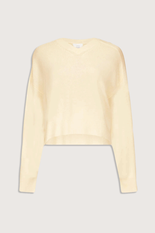 flat lay Anzor V-Nk Cashmere Sweater butter yellow Boxy fit
V neck
Drop shoulders
Ribbed details on the neckline, cuffs and hem