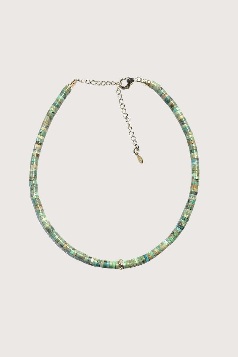 flat lay Apache Goldy Necklace Turquoise and goldfilled beads
Each piece is one of a kind
Length: 16,5"