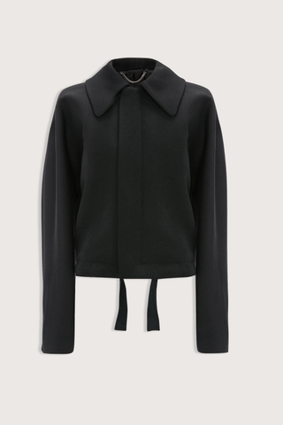 flat lay Arden Bomber Jacket black oversized fit Soft heavy gabardine
Hip length style with an oversized shoulder
Zip and Popper fastening
Side pockets and adjustable tied hem
100% Virgin Wool