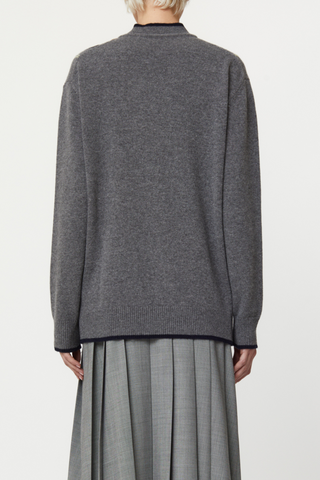 back profile model wearing Argyle Cashmere Sweater, V-neck, Grey base, Ribbed neck, cuff and hems
Classic fit