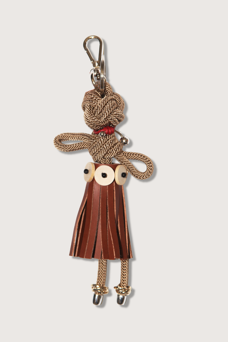 flat lay Aroha Key Ring charm Macramé of a doll design brown