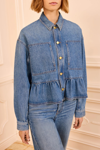 front profile model wearing Arquette Denim Jacket Danube blue denim
Non-stretch denim
peplum hem design
Designed for a boxy fit
Oversized patch pockets
Signature monogram buttons through front