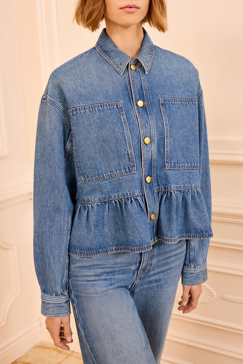 front profile model wearing Arquette Denim Jacket Danube blue denim
Non-stretch denim
peplum hem design
Designed for a boxy fit
Oversized patch pockets
Signature monogram buttons through front