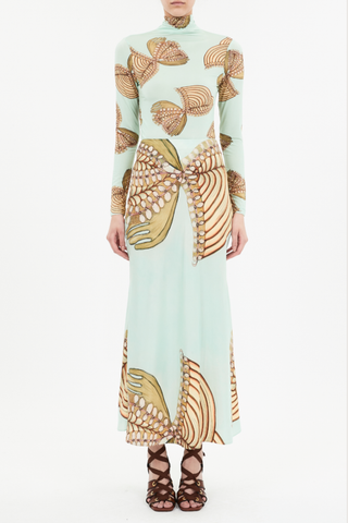 front profile model wearing Aurelia Turtleneck Top Mystical botanical print work of Art Brut painter Anna Zemánková
Tricot lightweight jersey
 close fit
Turtleneck
Long sleeves
Pullover style