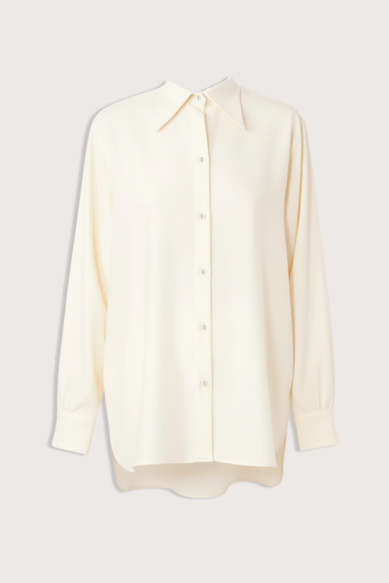 flat lay Auria Shirt Italian Twill Shirt ivory Loose-fit
Long-sleeve
Sharp shirt collar
100% Virgin wool
Button closure
Buttoned cuffs with cuff placket
Back yoke with an inverted pleat
Gathers at the cuffs
Curved hem with a longer back than front.
Cover buttons