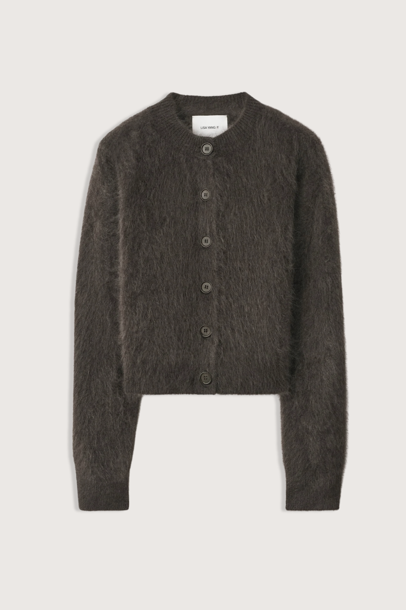 flat lay Azalea Brushed Cardigan dark fern Brushed cashmere
Close fit
Cropped silhouette
Round neck
Button-down fastening
Full-length sleeves
Ribbed hem
100% Cashmere