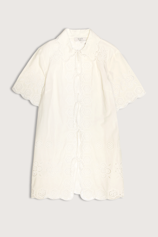 flat lay Babette Eyelet  Tie Front Coverup white Breezy mini silhouette
All-over eyelet detailing
Scalloped edges
Short sleeves
Front tie closures
Relaxed fit
Self: 100% cotton
Embroidery: 100% Polyester
