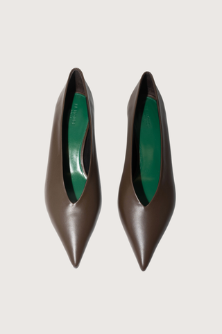 top profile Babouche Kitten Heel Handcrafted in chocolate brown leather
Green contrast heel
Contrast green insole
Pointy toe
40mm heel