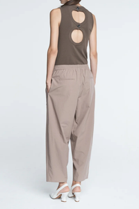 back profile model wearing Balloon Drawstring Trouser Mouseback 
Tapered bottom
organic washed cotton
Loose drawstring trousers
Side pocketing
front pleats