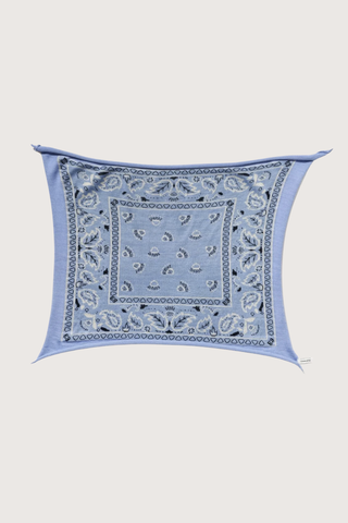 flat lay open Bandana Cashmere Scarf Sky  100% cashmere
Bandana print
Hand-knit construction
27" Width x 24" Length
