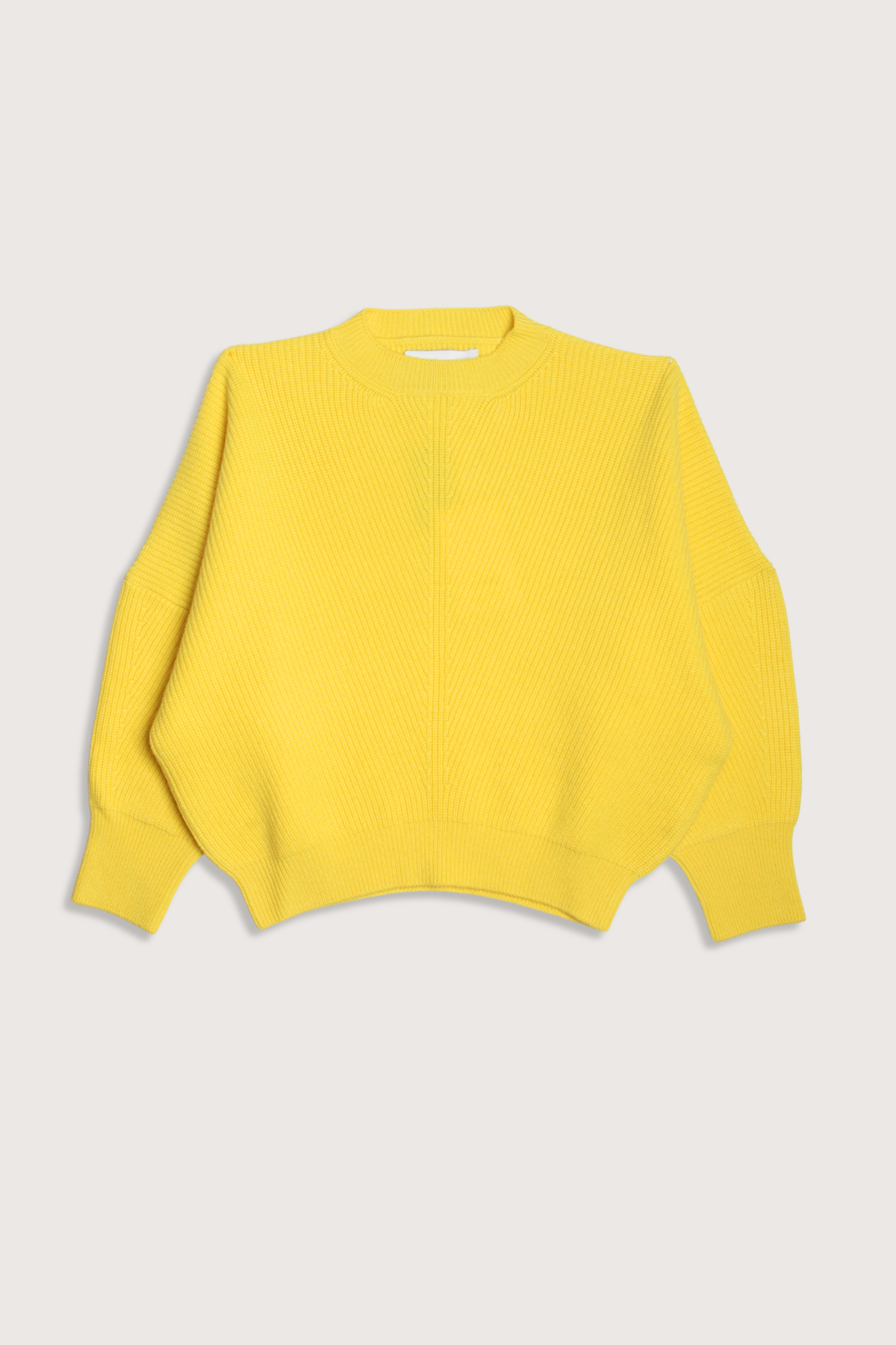 flat lay Batwing Sweater Vivid Yellow Sculptural Batwing sleeve
Pure cashmere
Relaxed, cropped silhouette
Round neckline
Subtle ribbed trims at the cuffs and hem