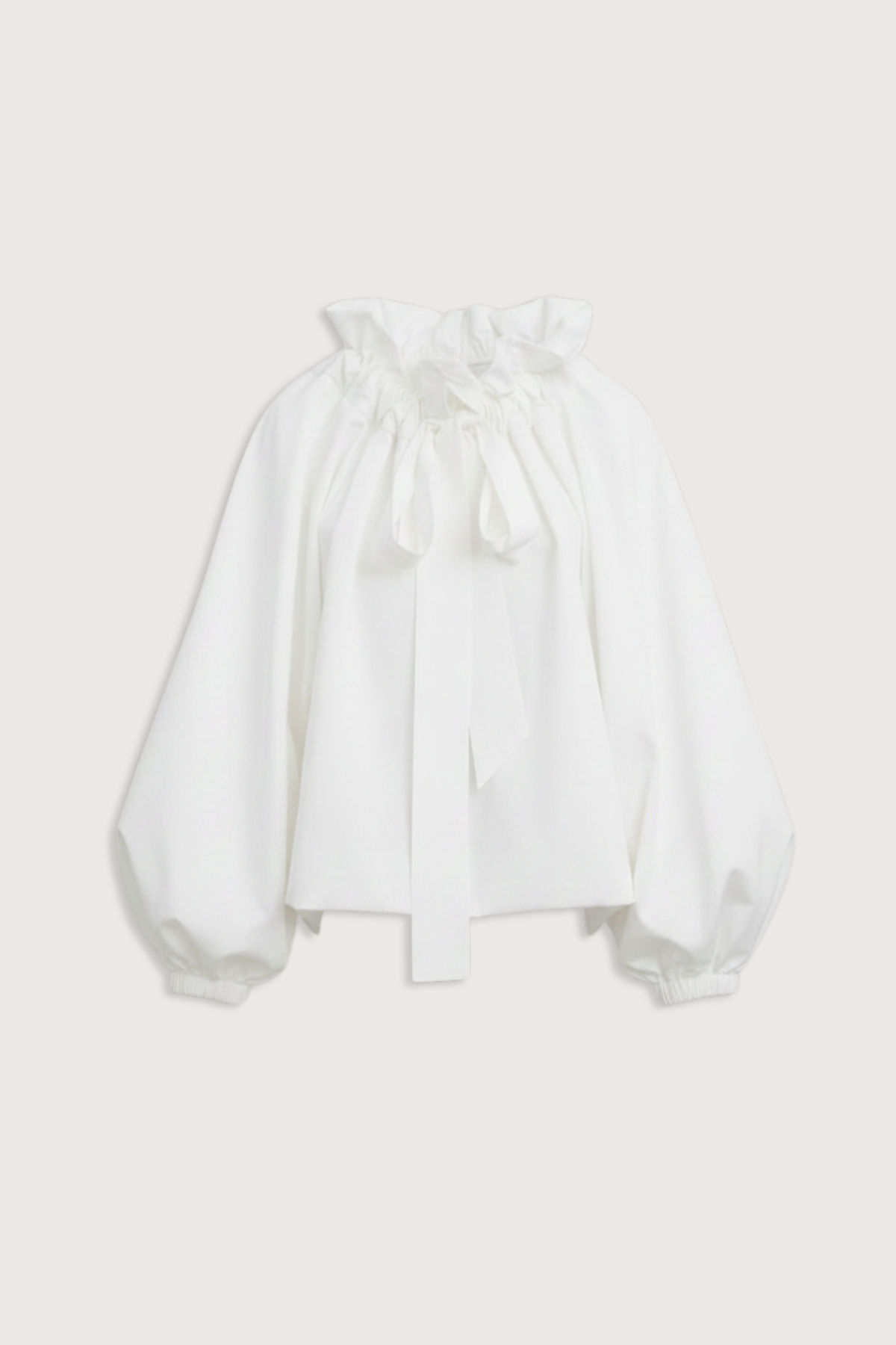flat lay Beautiful Mess Top Cloud white Bow neck
puff sleeves
Grand ruffle neck cinched in with lovely wide ribbon
Long sleeve
Elastic cuff
Straight hem
100% Cotton