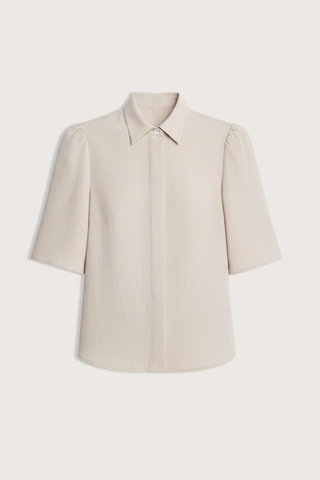 flat lay Bell Sleeve Blouse champagne Bell Sleeve blouse
Naia Sateen
Signature corozo buttons and covered placket
Slim fit blouse
100% Acetate
