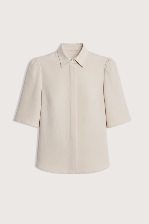 flat lay Bell Sleeve Blouse champagne Bell Sleeve blouse
Naia Sateen
Signature corozo buttons and covered placket
Slim fit blouse
100% Acetate