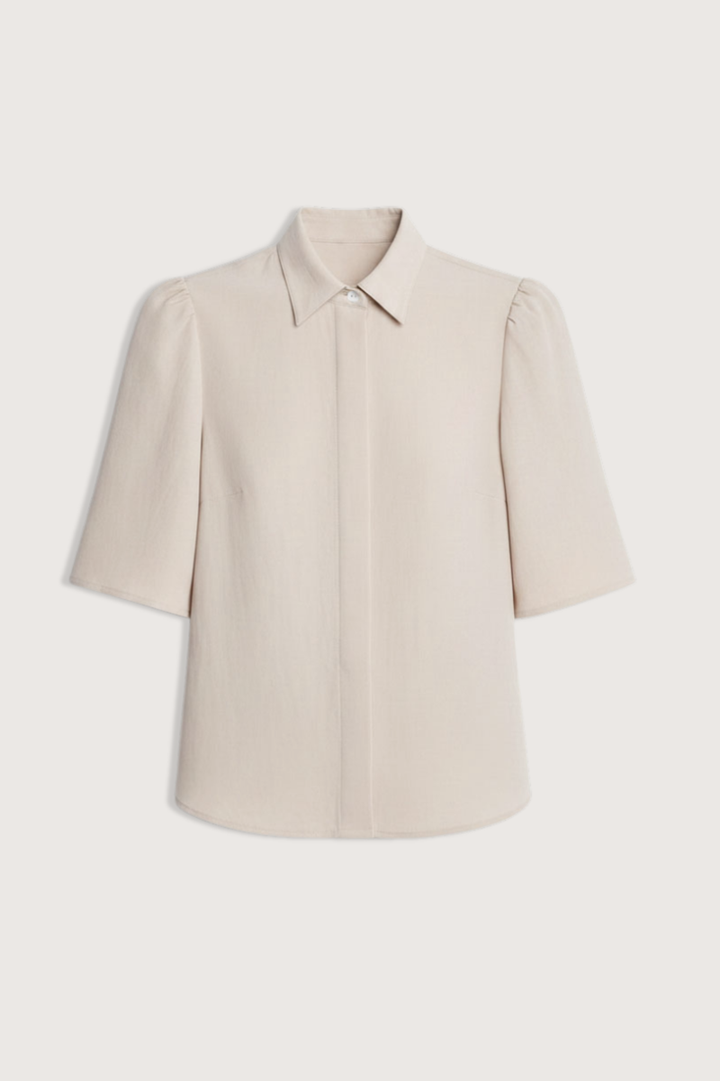 flat lay Bell Sleeve Blouse champagne Bell Sleeve blouse
Naia Sateen
Signature corozo buttons and covered placket
Slim fit blouse
100% Acetate