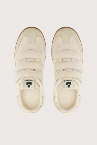 top profile Beth Velcro Sneaker Chalk/Champagne Low-top suede, sheepskin leather, and calfskin leather sneakers
Round toes
Padded tongues with a logo label
Velcro straps
Yoke on the side with a contrasting "IM" logo
Contrasting yoke in back with an embossed "Isabel Marant" logo
Soft leather insoles and lining
Rubber outsoles

100% bovine leather