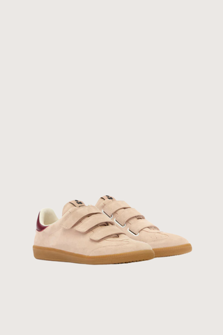 angled profile Beth Velcro Sneaker Pale  Low-top suede, sheepskin leather, and calfskin leather sneakers
Round toes
Padded tongues with a logo label
Velcro straps
Yoke on the side with a contrasting "IM" logo
Contrasting yoke in back with an embossed "Isabel Marant" logo
Soft leather insoles and lining
Rubber outsoles

100% bovine leatherPink/Peach