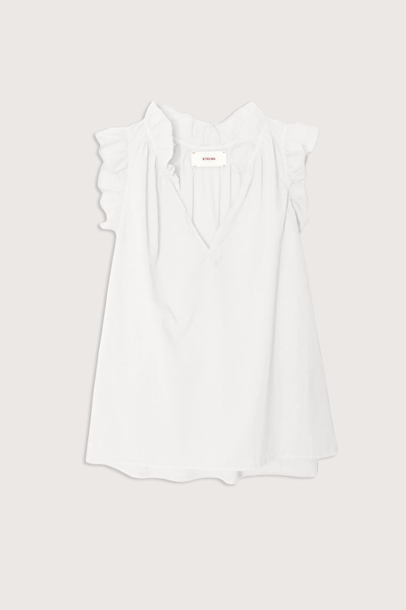 flat lay Bex Poplin Top White Lightweight woven cotton poplin
Popover style
Deep V-neck
Ruffle detailing
Shirring throughout
Cotton Poplin | 100% Cotton