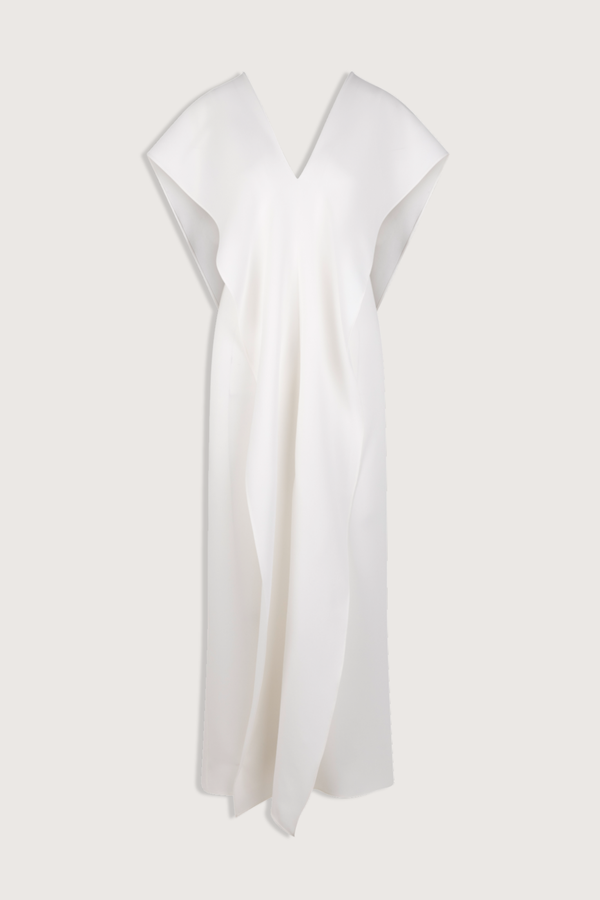 flat lay Bibi Silk Crepe V-Neck Dress white silk
Midi dress
Back cape
Mid-weight silk crepe
Dress is stitched down the center front with a fold-over drape that creates at cap sleeve
The back top layer falls into a dramatic cape