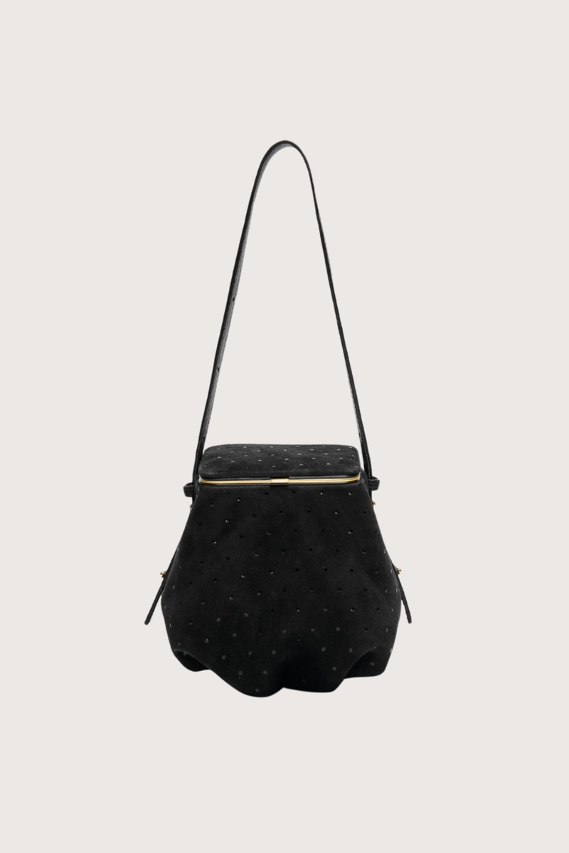 front profile Blaine Short Strap Bag Black Suede Pouch style bag
Single latch closure
Voluminous pleated pouch
Adjustable strap in nappa leather
Italian suede with applied mini-dots
24k gold-plated hardware
