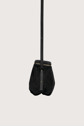 side profile Blaine Short Strap Bag Black Suede Pouch style bag
Single latch closure
Voluminous pleated pouch
Adjustable strap in nappa leather
Italian suede with applied mini-dots
24k gold-plated hardware

