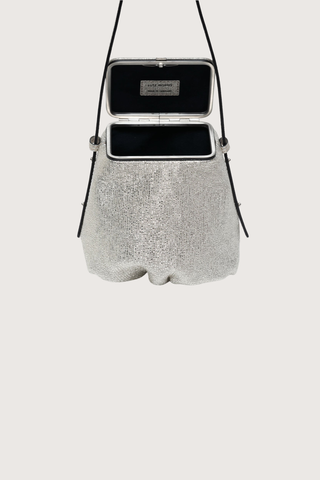 open detail Blaine Short Strap Bag Silver Metallic Pouch style bag
Single latch closure
Voluminous pleated pouch
Adjustable strap in nappa leather
Italian suede with applied mini-dots
24k gold-plated hardware
