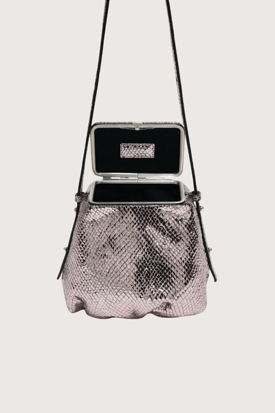 open detail Blaine Short Strap Disco Ball Metallic Pouch style bag
Single latch closure
Voluminous pleated pouch
Adjustable strap in nappa leather
Italian suede with applied mini-dots
24k gold-plated hardware
