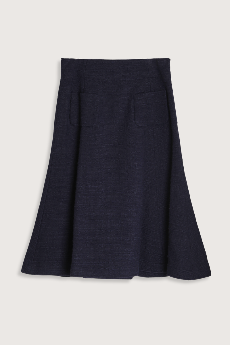 flat lay Boucle Flare Skirt Blue textured knee-length
A-line skirt
High waist
Structured fabric
Clean finish
Two front patch pockets