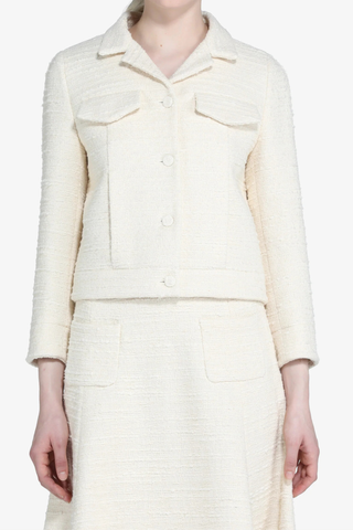 front profile model wearing Boucle Jacket Cream Cream bouclé jacket
Button-front closure
Classic collar
Straight-fit design
Long&nbsp;3/4 sleeves
Front pockets
Traditional finish
Classic construction
