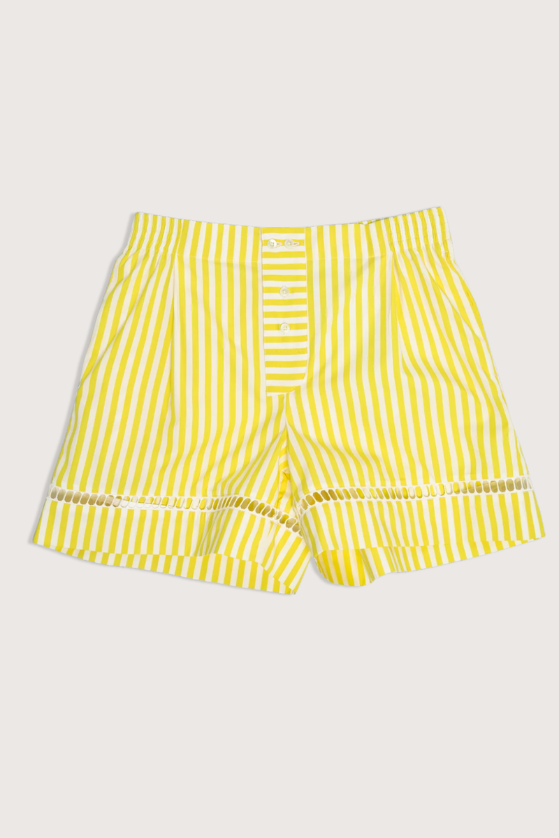 flat lay Boxer With Embroidered Hem Shorts yellow white vertical stripe Venetian boxer
Hemstitch embroidery
Straight leg
Mid-rise
Relaxed fit
Elasticated at the waist
Yellow and white vertical stripe
Mother-of-pearl buttona
Medium weight cotton
100% two-ply cotton poplin woven in Italy