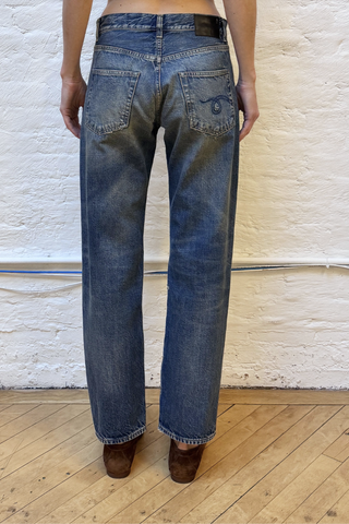 back profile model wearing Boyfriend Jean Rigid Bowery Indigo Straight-leg boyfriend fit
Turkish rigid indigo denim
Medium-Dark indigo wash
Mild wear pattern.
13 oz 100% cotton
27.17”