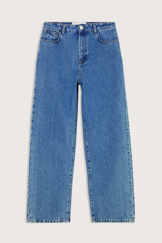 flat lay Bruun Signature Baggy Denim heritage mid wash blue Classic denim
Pure cotton in a denim blue tone
Low-waist fit
Elongating wide baggy leg
Branded metal button
100% cotton