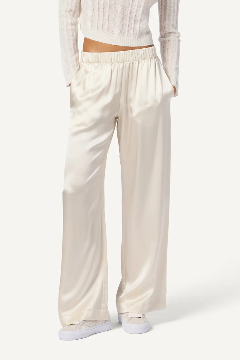 model wearing Brynn Wide Leg Silk Pant Gardenia white with elastic waist